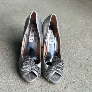 Luxury designer Badgley Mischka heels.Used couple of times.Gray with beaded bow.